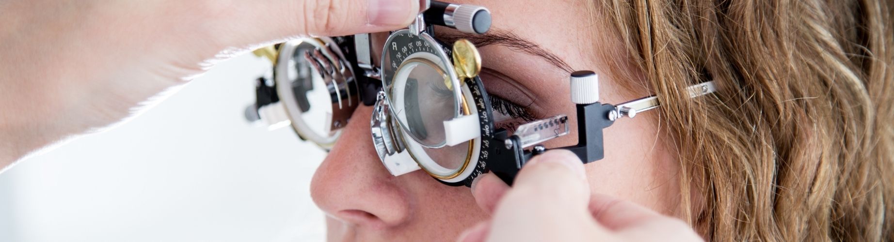 prescription glasses on a shelf