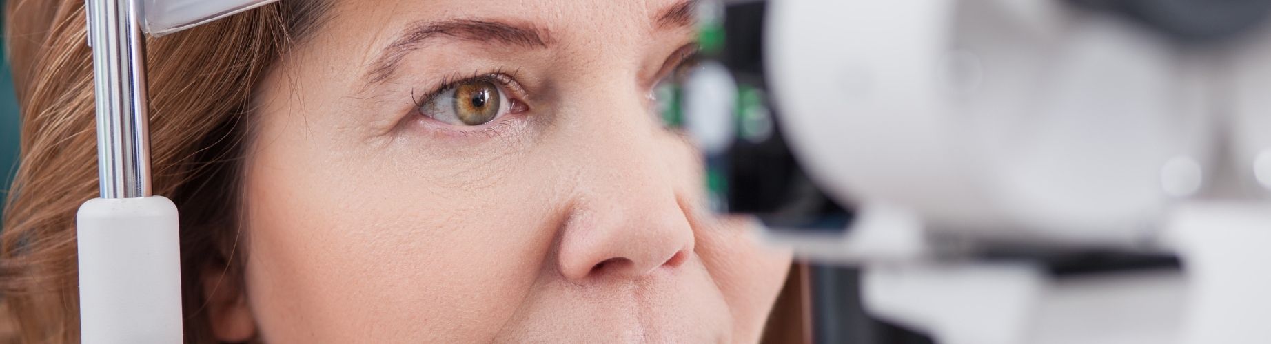 woman taking an eye exam